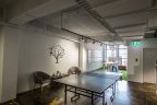 area for staff to have down time in the office. Table tennis area, side area to relax and watch tv or interact