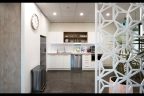 Modern Office Kitchen in white and neutral tones and Metal shaped partition